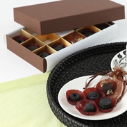 キモチイイを届ける　炭のチョコラ（１２個入り）　｜　株式会社アスカム・静岡県